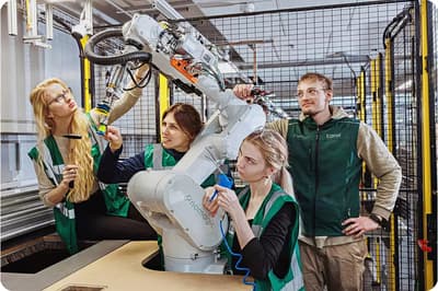 Nomagic staff around a Nomagic robot
